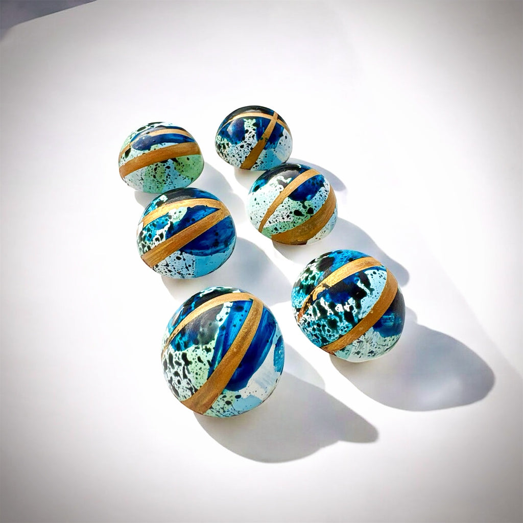 White chocolate bonbon filled with  exquisite raspberry ganache